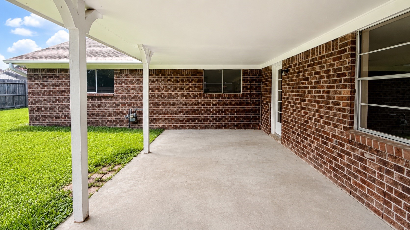 4418 Ponca Street Pasadena, TX 77504 - Photo 21 of 23 Covered patio space for shade, seating, and easy outdoor use. (image has been enhance for marketing purposes)