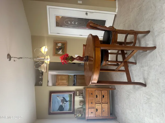 a living room with furniture and decor