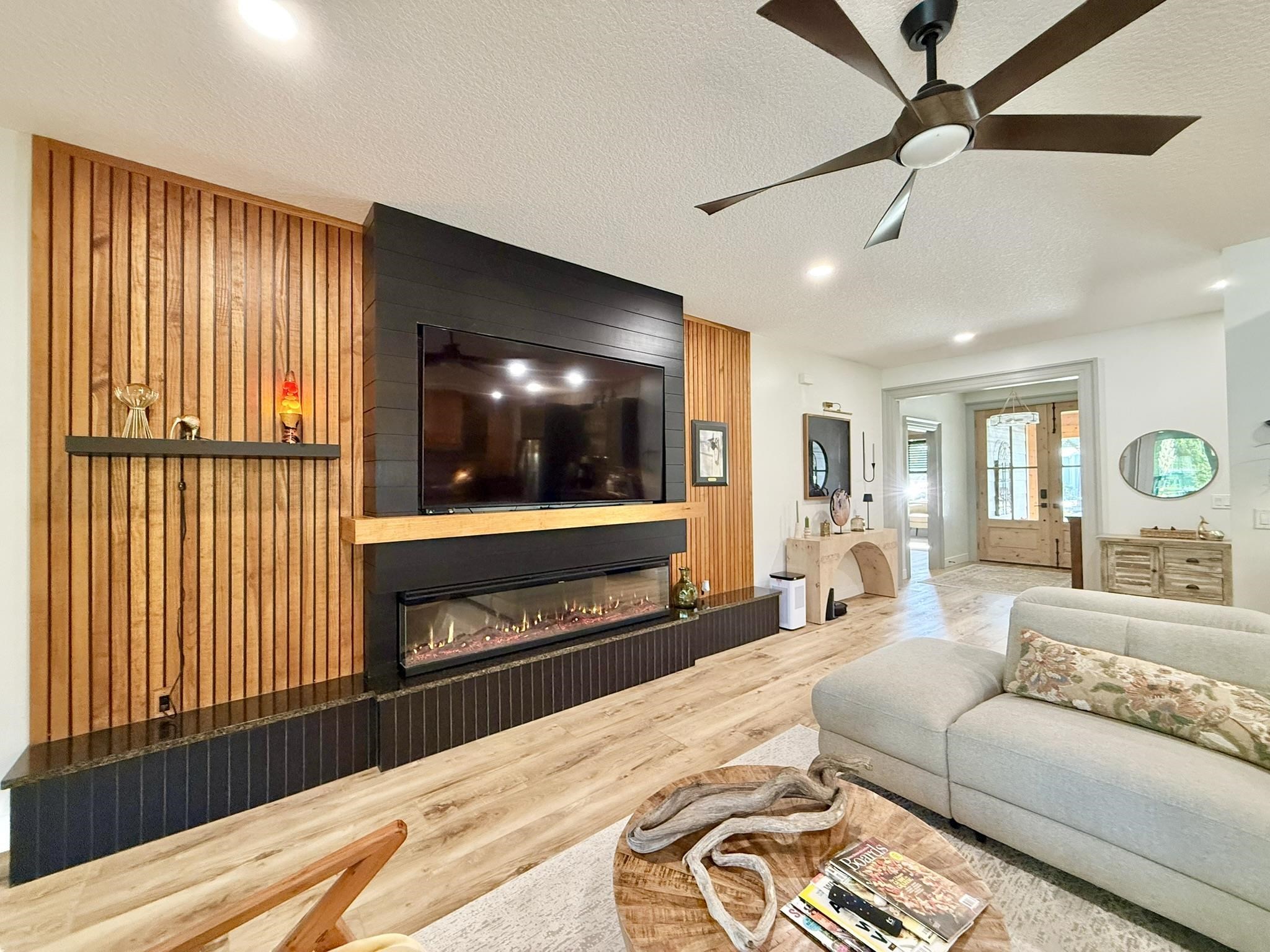 146 Maple Tree Lane Elkton, FL 32033 - Photo 13 of 75 a living room with furniture and a flat screen tv