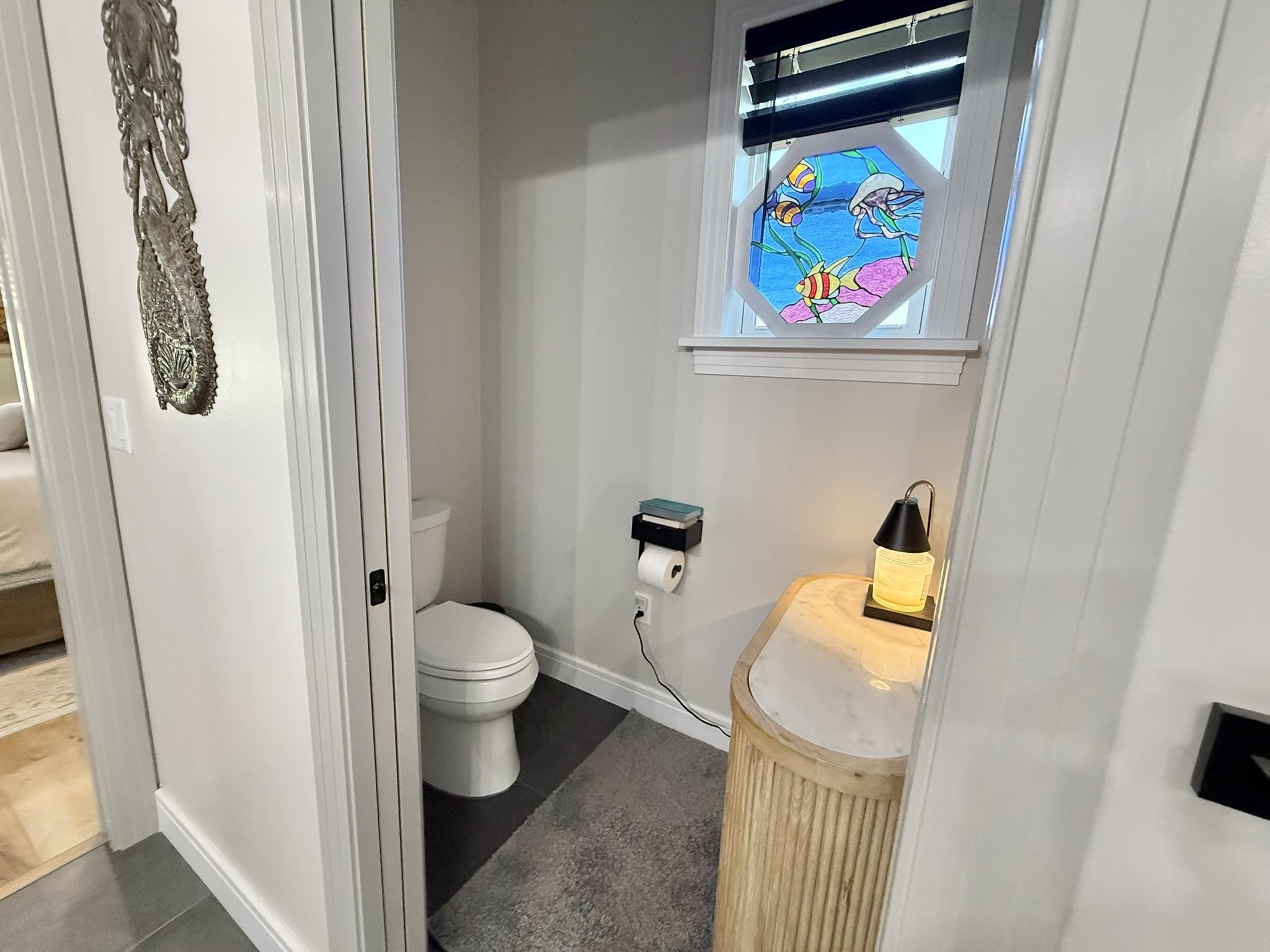 146 Maple Tree Lane Elkton, FL 32033 - Photo 26 of 75 a bathroom with a toilet and a sink