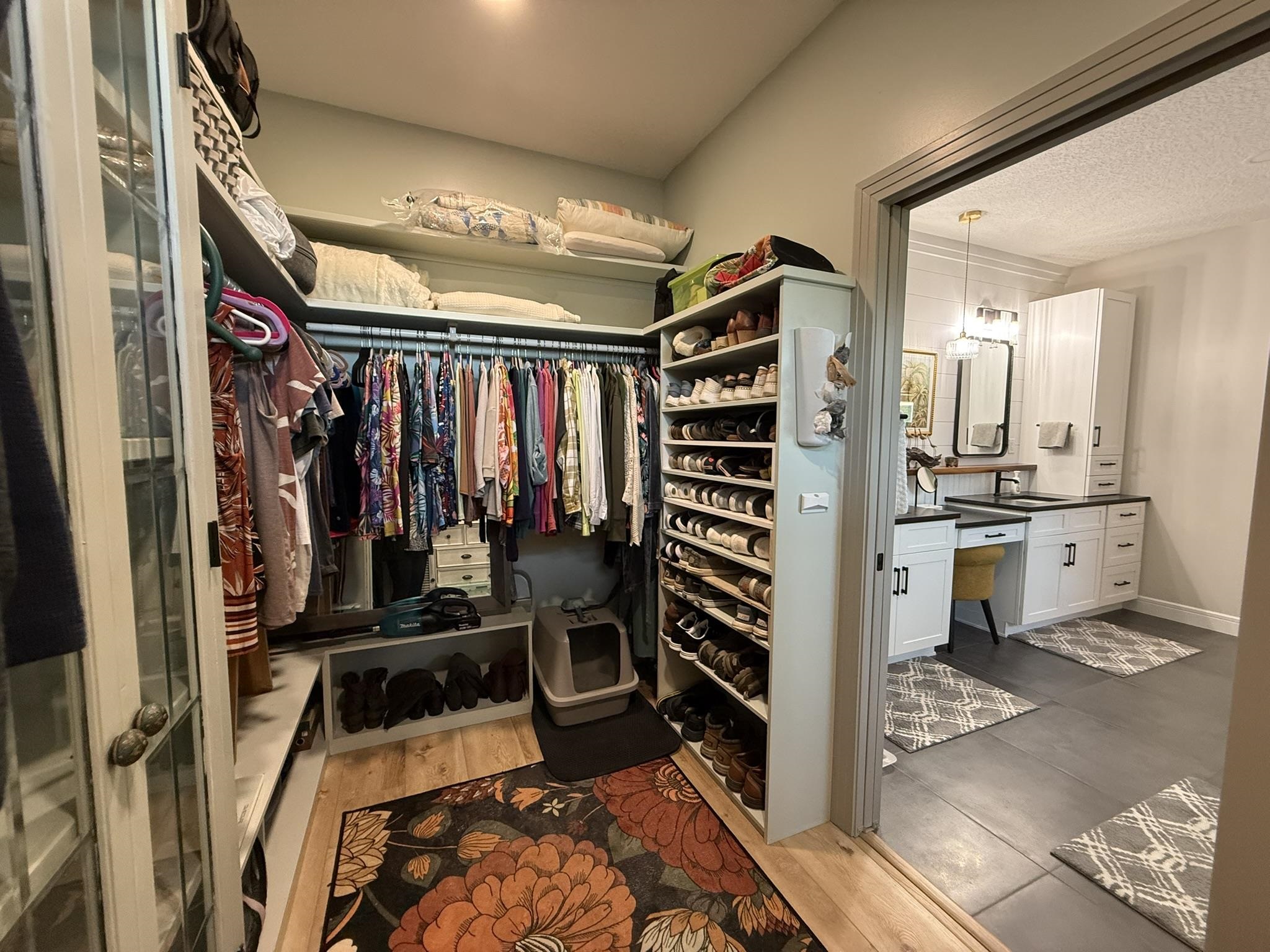 146 Maple Tree Lane Elkton, FL 32033 - Photo 29 of 75 a view of walk in closet with clothes and shoes