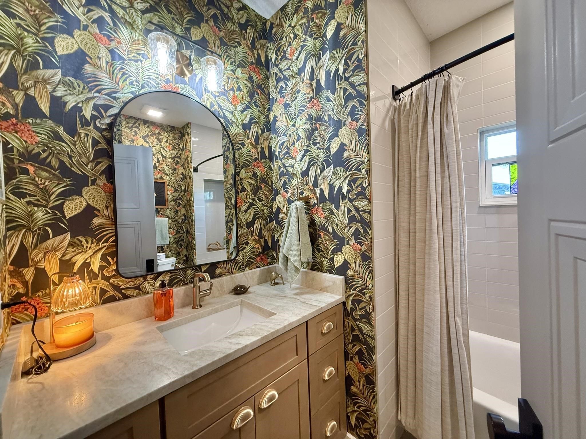 146 Maple Tree Lane Elkton, FL 32033 - Photo 31 of 75 a bathroom with a sink and a mirror