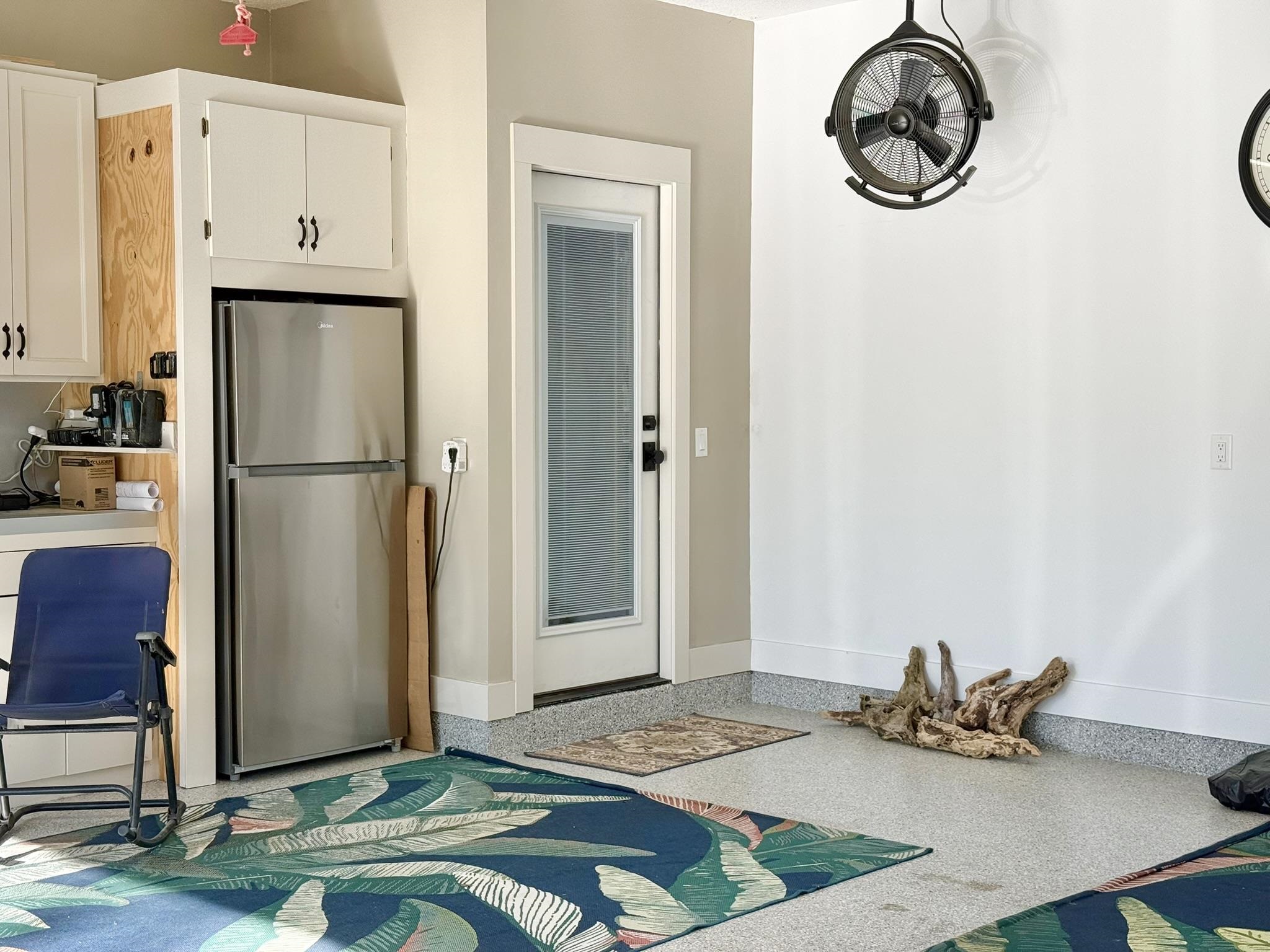 146 Maple Tree Lane Elkton, FL 32033 - Photo 53 of 75 a kitchen with a refrigerator and a stove