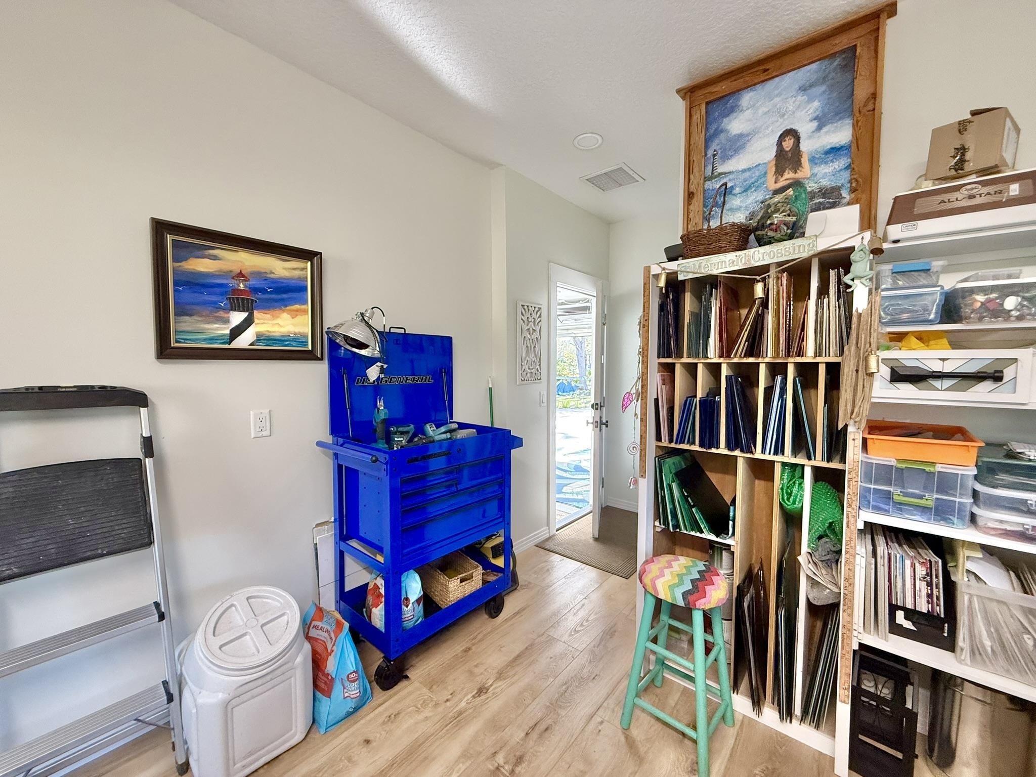 146 Maple Tree Lane Elkton, FL 32033 - Photo 54 of 75 a living room with lots of furniture and a flat screen tv