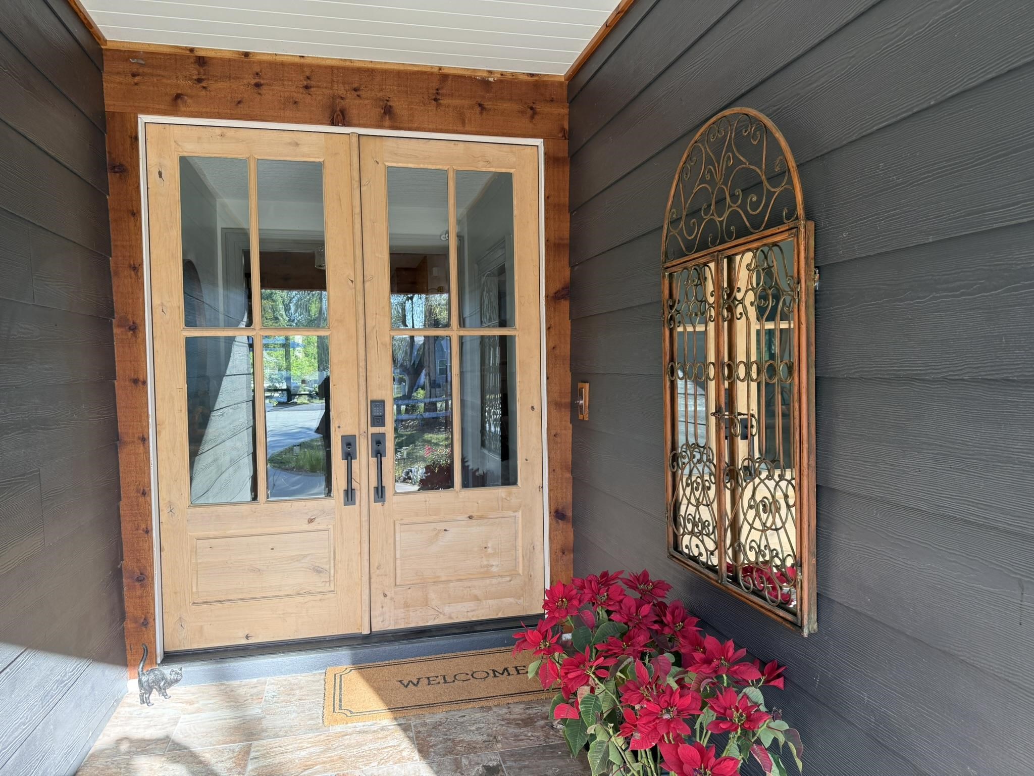 146 Maple Tree Lane Elkton, FL 32033 - Photo 6 of 75 a potted plant sitting in front of a house