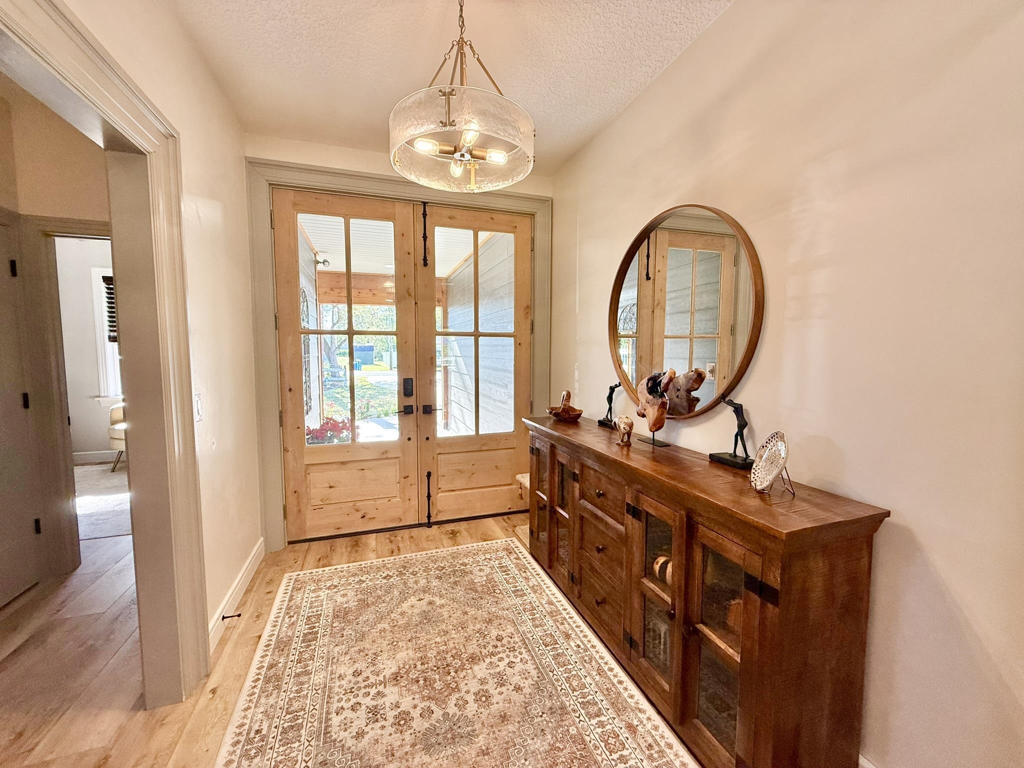 146 Maple Tree Lane Elkton, FL 32033 - Photo 8 of 75 a large spacious bathroom with a double vanity sink and a large mirror