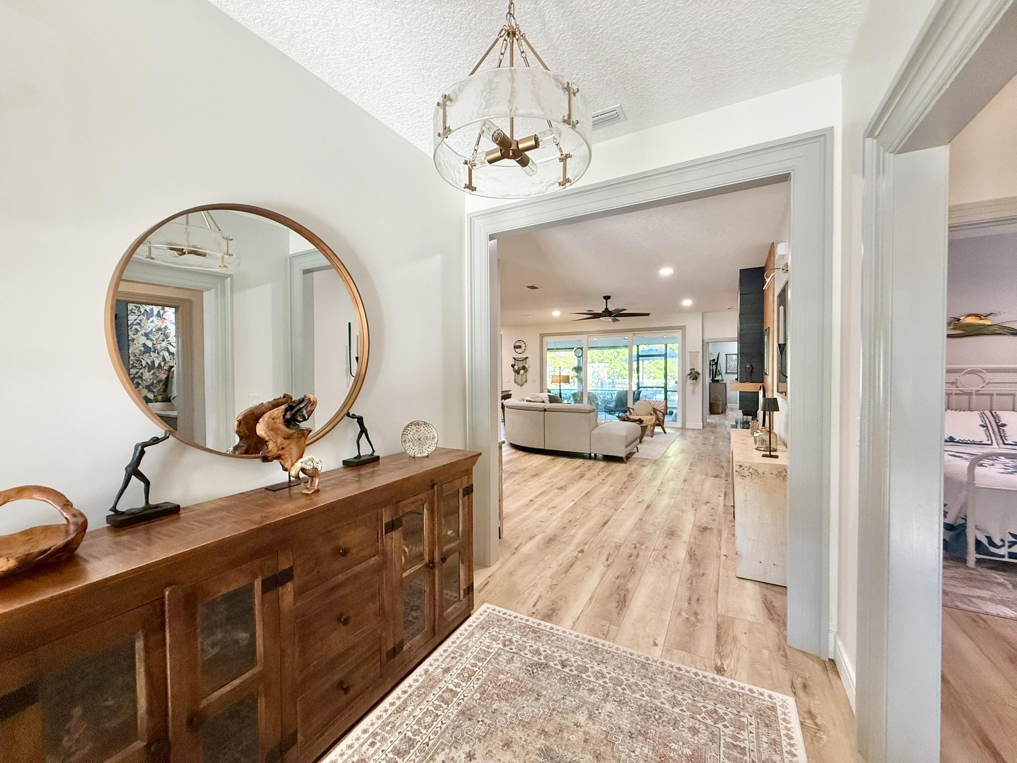 146 Maple Tree Lane Elkton, FL 32033 - Photo 9 of 75 a view of living room with kitchen island granite countertop furniture and a large mirror