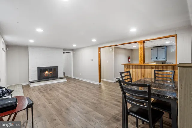 a view of a hallway with seating area