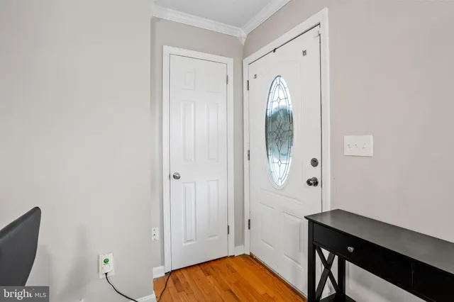 a view of a livingroom with furniture and wooden floor
