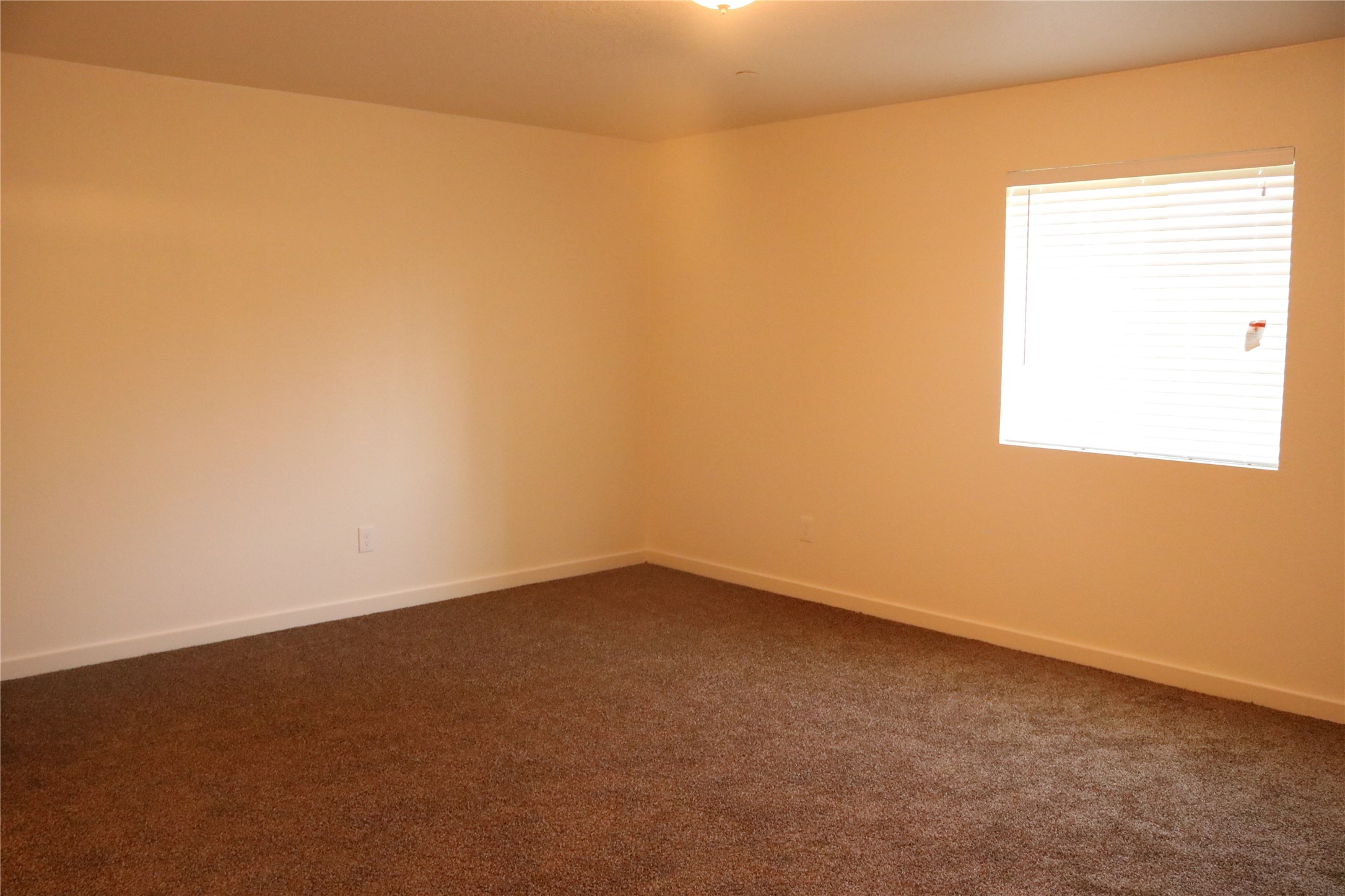 10535 Mills Road, Unit 3A Houston, TX 77070 - Photo 25 of 50 an empty room with a window