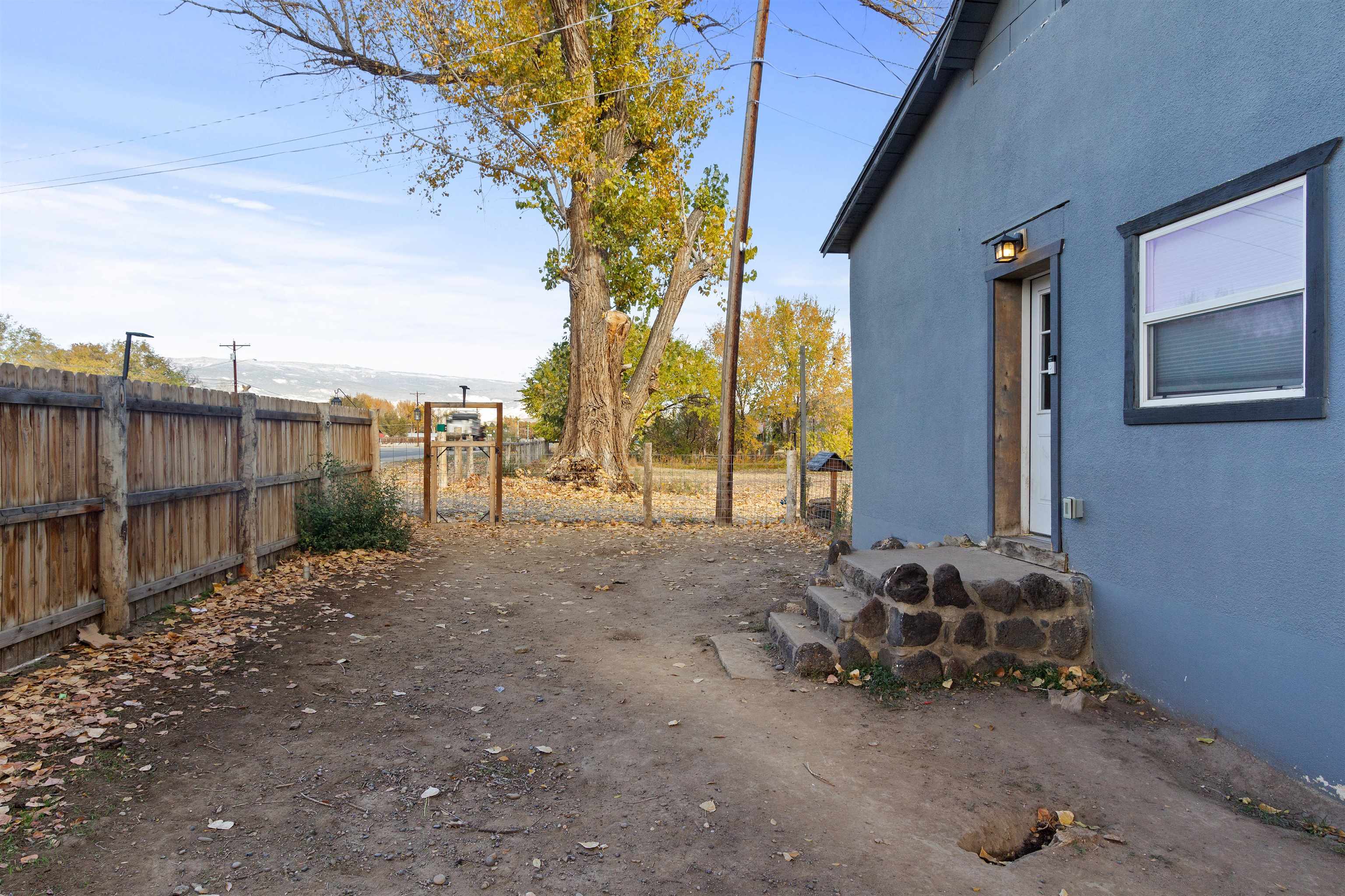 701 Highway 50 Delta, CO 81416 - Photo 26 of 31 a view of backyard with trampoline