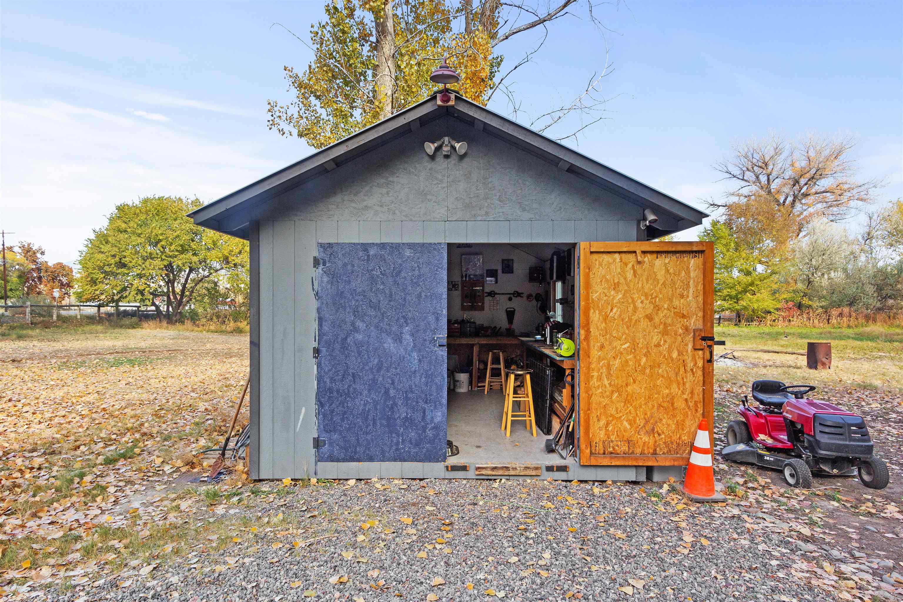 701 Highway 50 Delta, CO 81416 - Photo 28 of 31 a front view of a house with garden