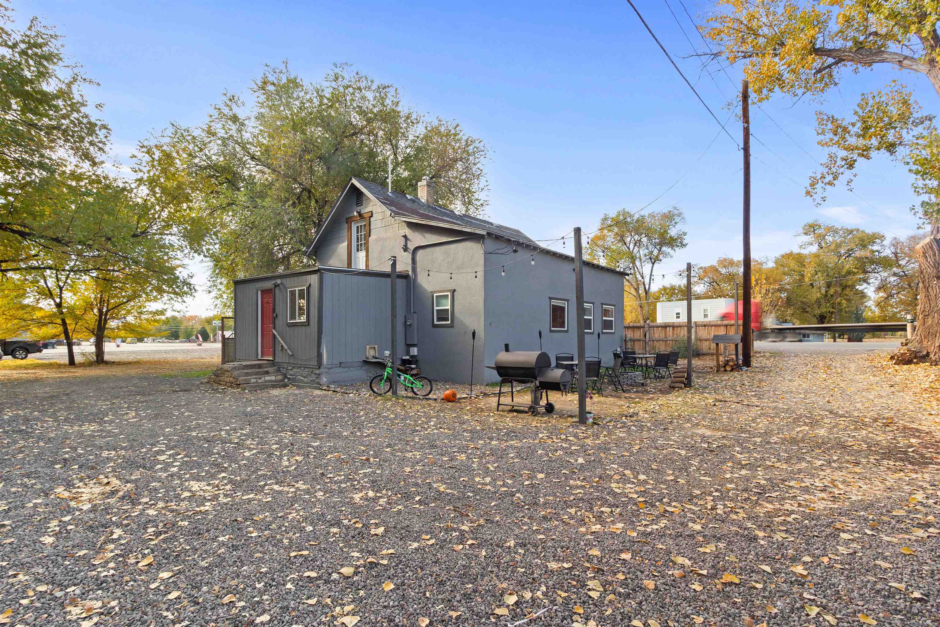 701 Highway 50 Delta, CO 81416 - Photo 31 of 31 a view of a house with a yard and sitting area