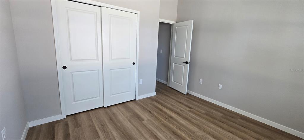 9975 Southwest 39th Terrace Ocala, FL 34476 - Photo 12 of 13 a view of an empty room with closet and a window