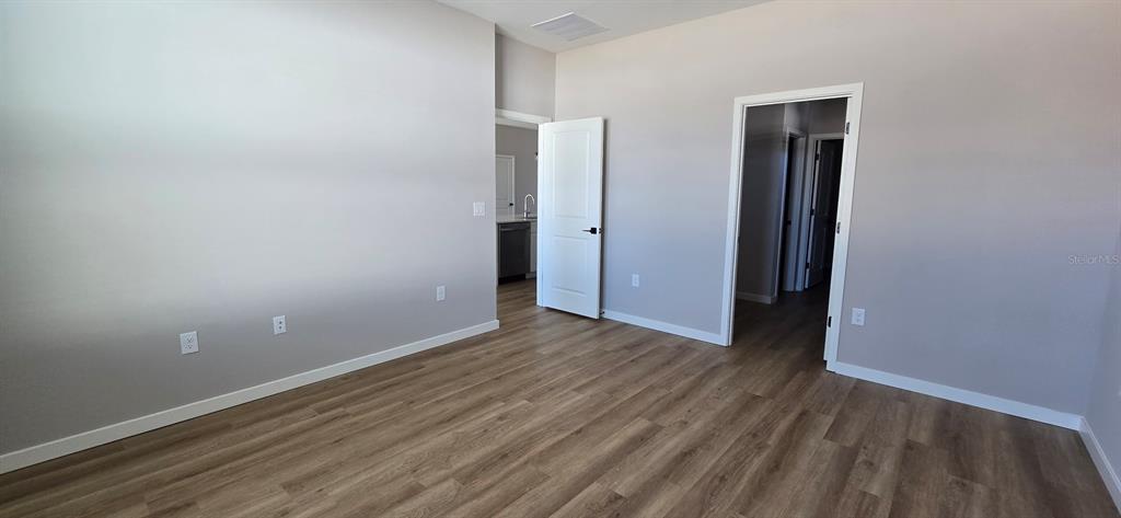 9975 Southwest 39th Terrace Ocala, FL 34476 - Photo 7 of 13 a view of an empty room with closet and a window