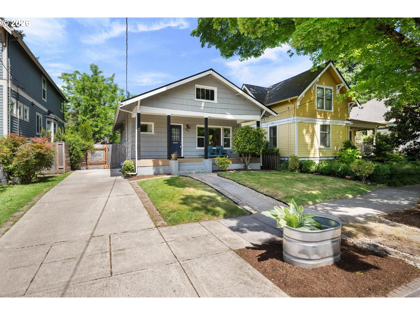 3725 North Baldwin Street Portland, OR 97217 - Photo 1 of 43 a view of a house with backyard and garden