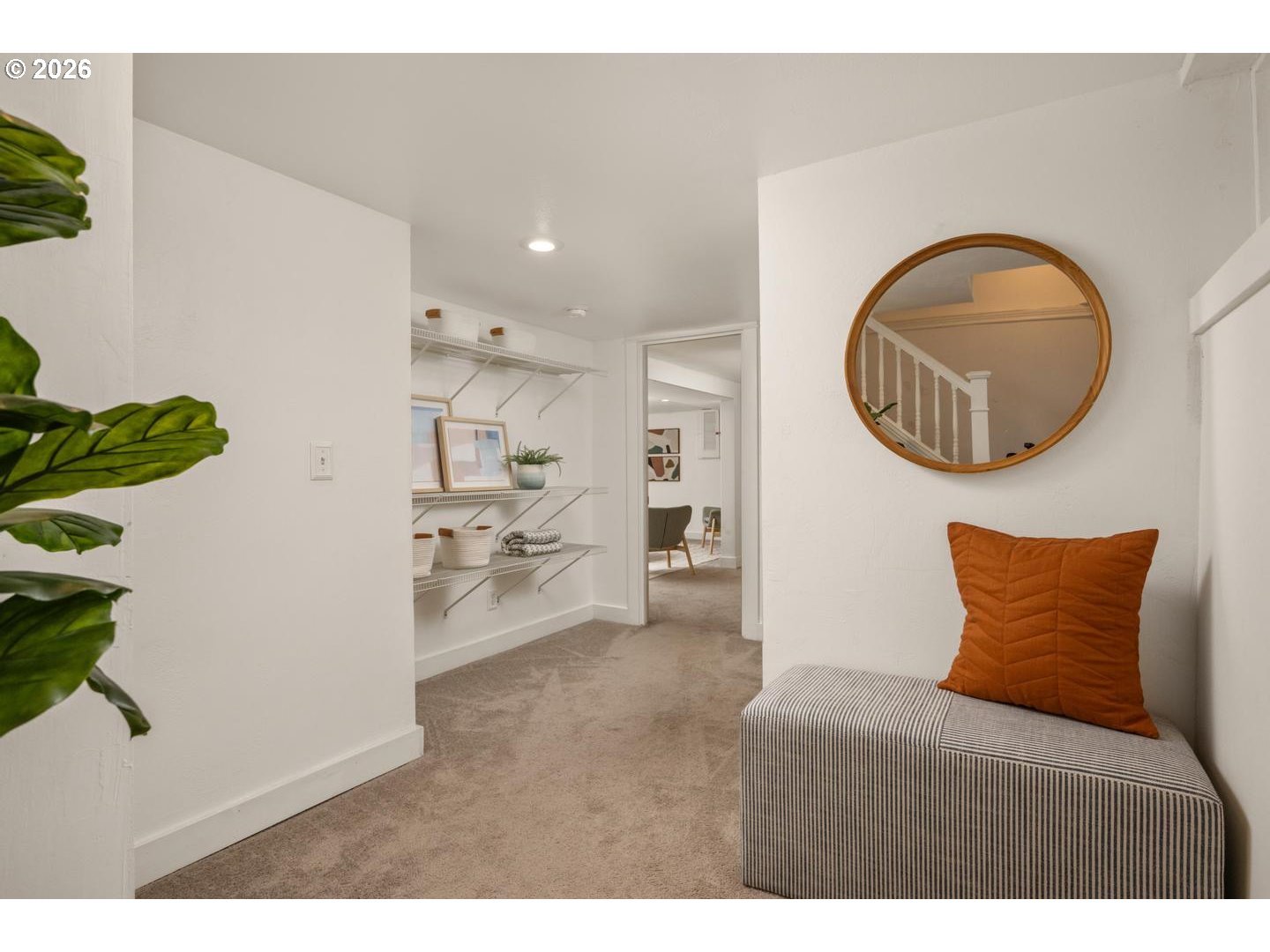 3725 North Baldwin Street Portland, OR 97217 - Photo 21 of 43 a bedroom with a bed and a potted plant
