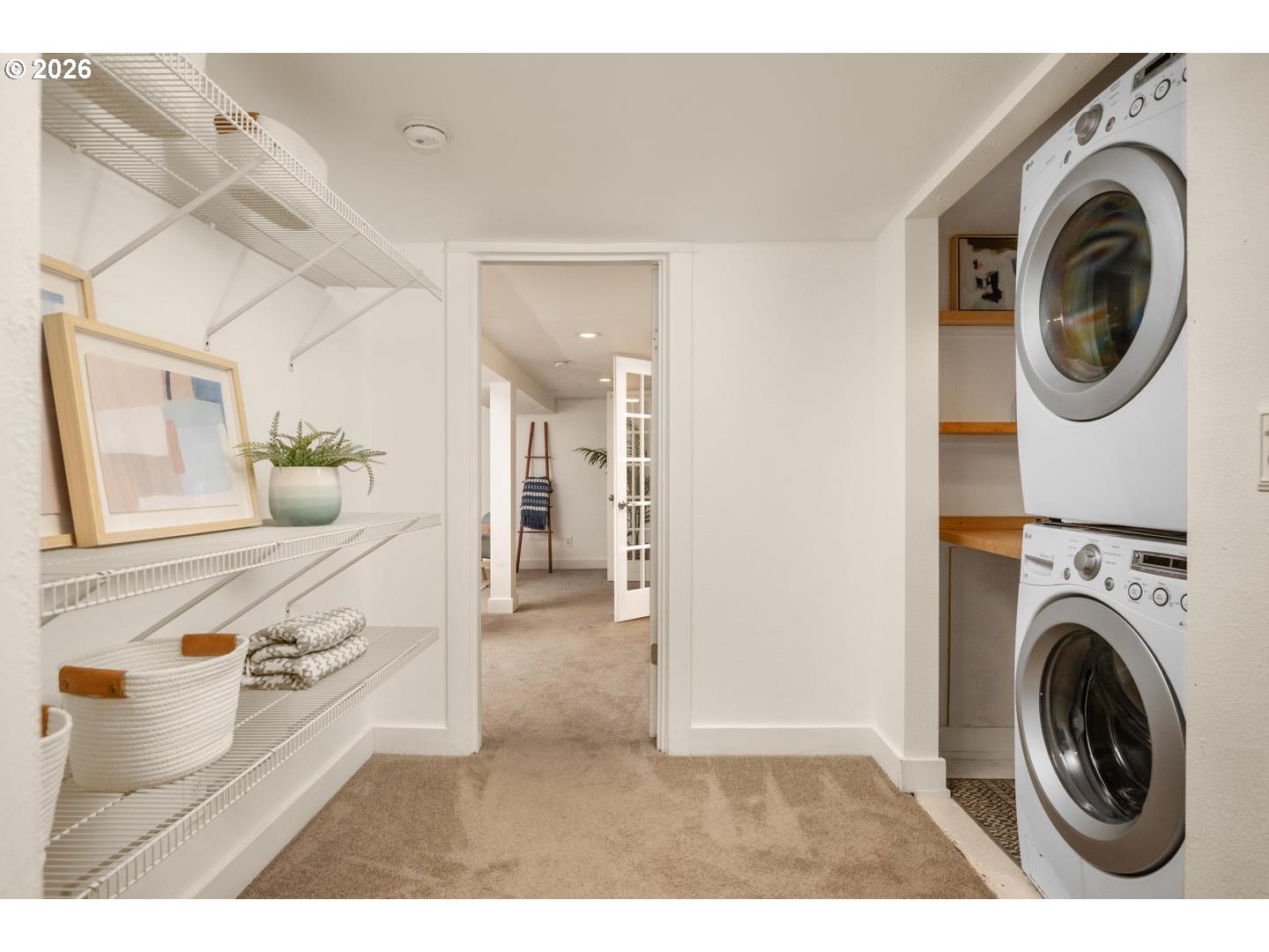 3725 North Baldwin Street Portland, OR 97217 - Photo 22 of 43 a living room with furniture and a washer dryer