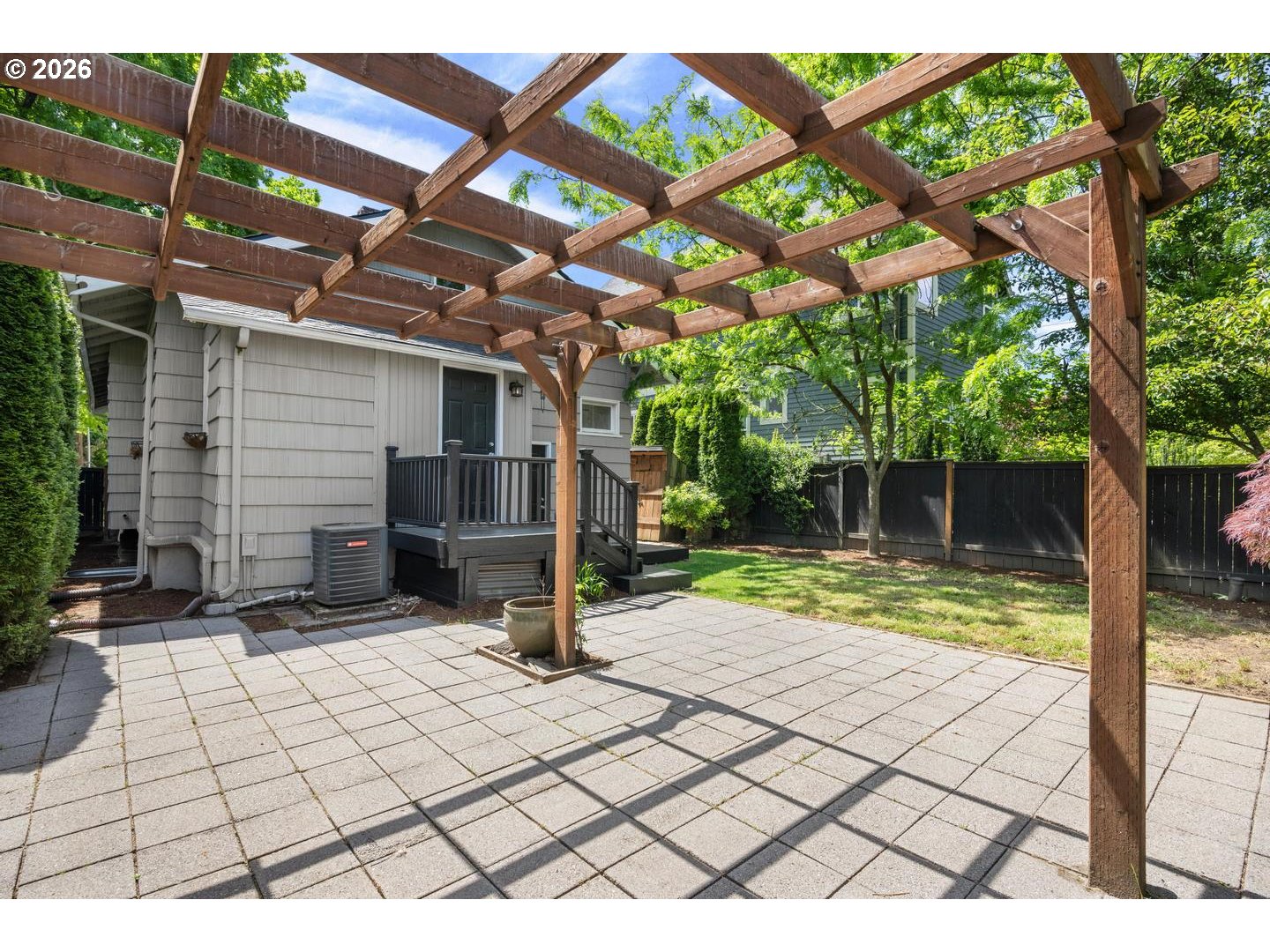 3725 North Baldwin Street Portland, OR 97217 - Photo 36 of 43 a view of a porch with furniture and a yard