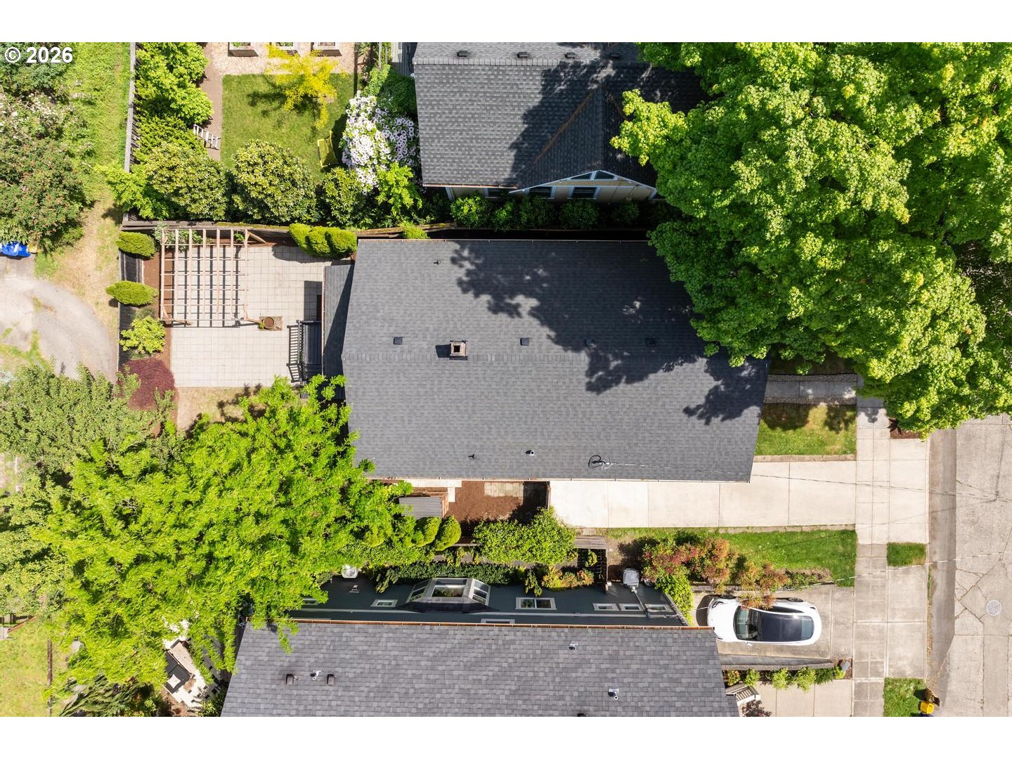 3725 North Baldwin Street Portland, OR 97217 - Photo 39 of 43 an aerial view of a house with a yard basket ball court and outdoor kitchen