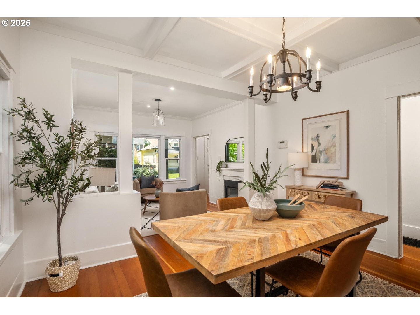 3725 North Baldwin Street Portland, OR 97217 - Photo 7 of 43 a view of a dining room with furniture and a chandelier