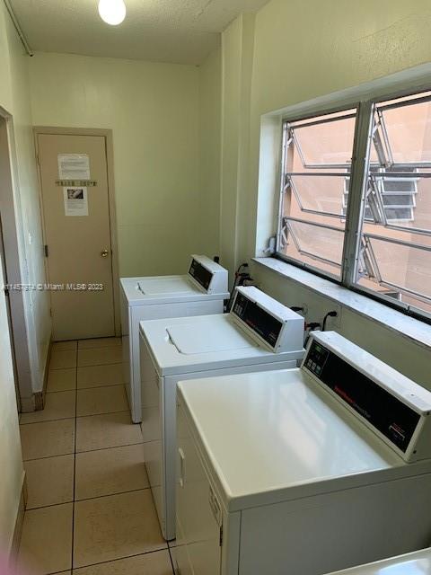 Hialeah Hialeah, FL 33012 - Photo 8 of 18 a utility room with dryer and washer