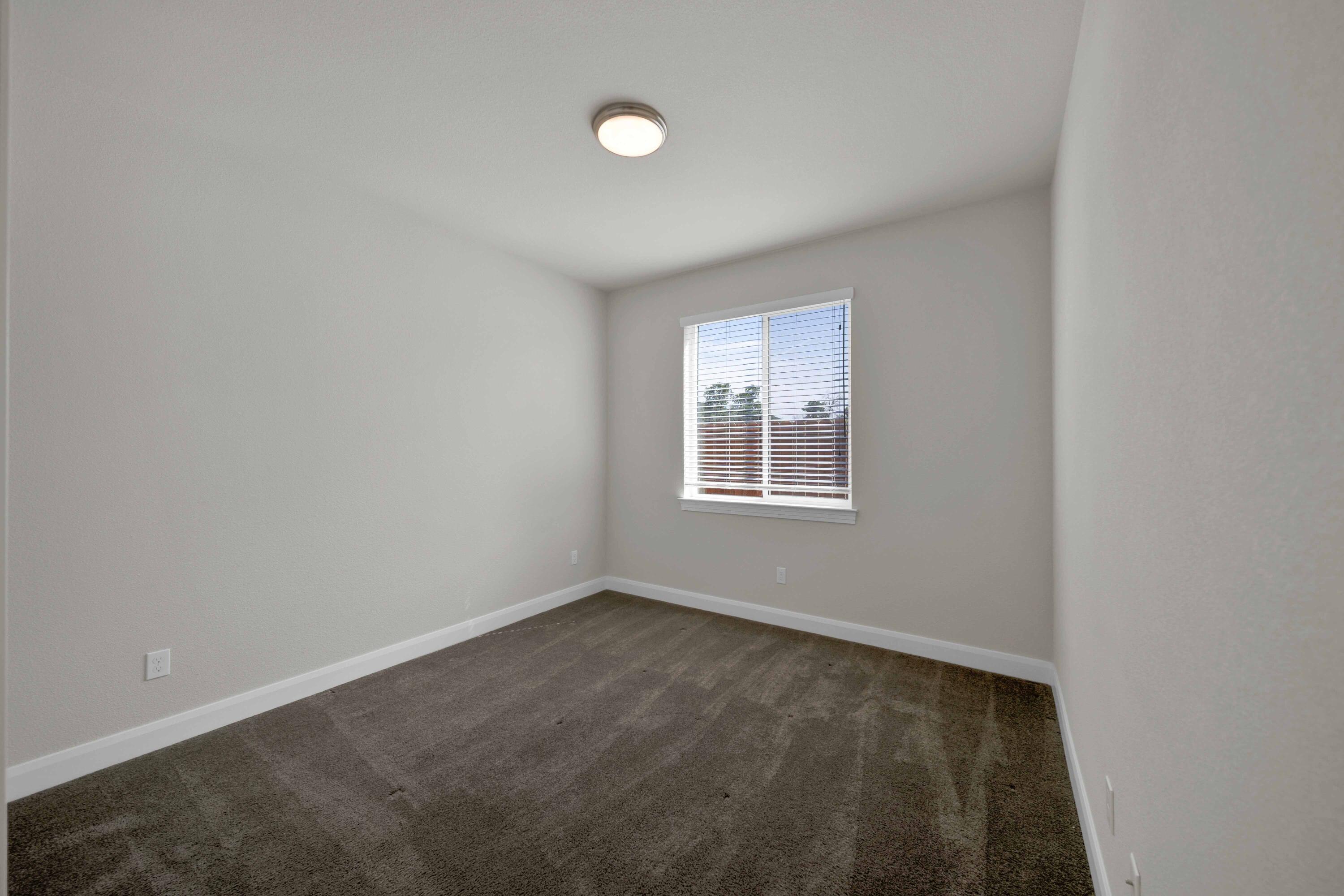 4771 Lower Springs Road Redding, CA 96001 - Photo 24 of 34 an empty room with windows