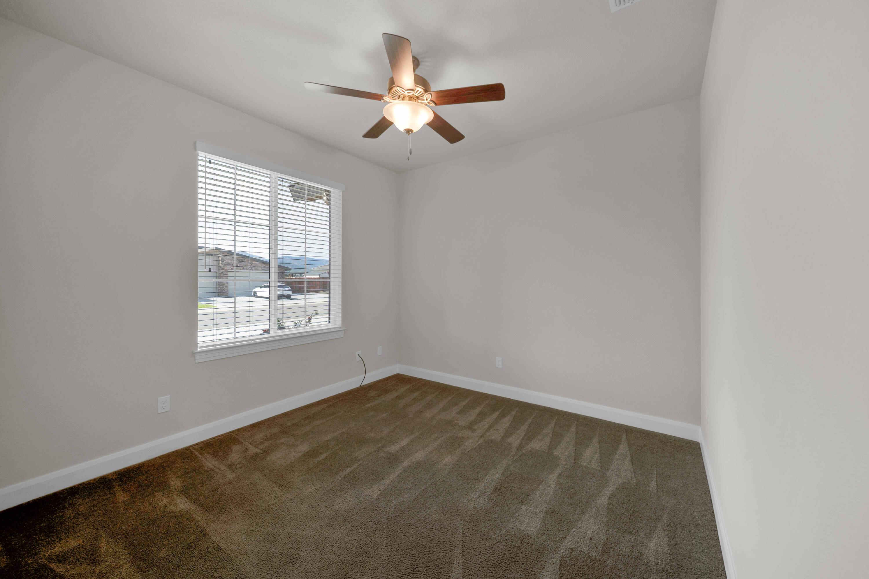 4771 Lower Springs Road Redding, CA 96001 - Photo 25 of 34 an empty room with a window