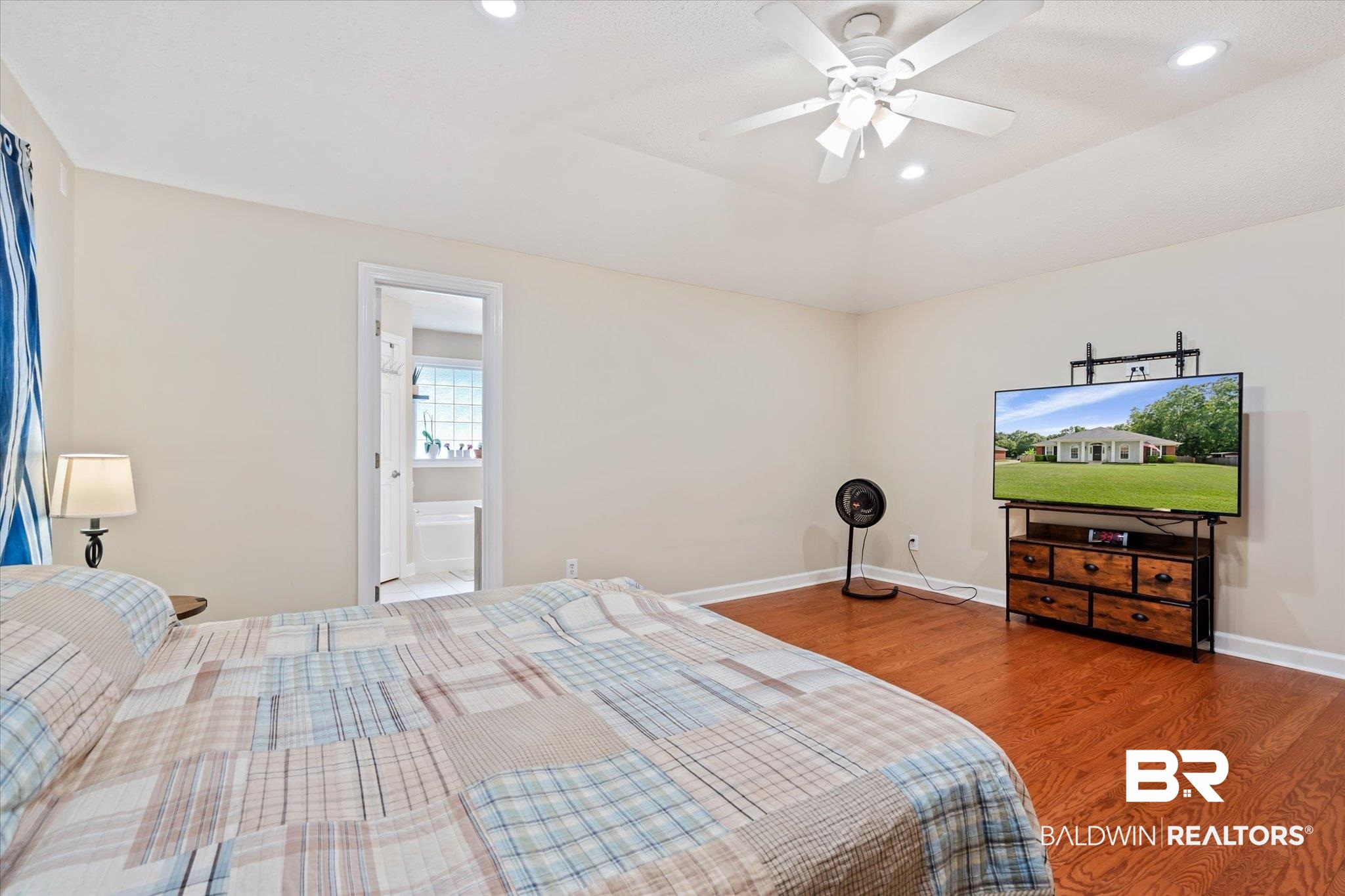 2320 Sequoya Trail Mobile, AL 36695 - Photo 10 of 20 Bedroom featuring wood-type flooring, ensuite bath, and ceiling fan