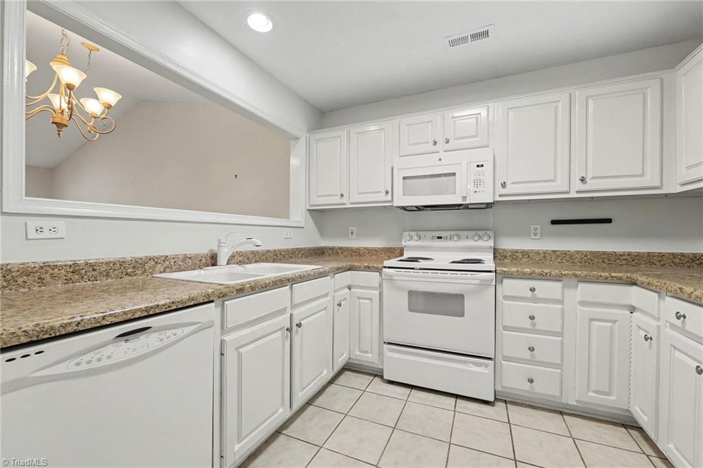 4405 Single Tree Lane High Point, NC 27265 - Photo 9 of 28 Kitchen with good cabinet storage
