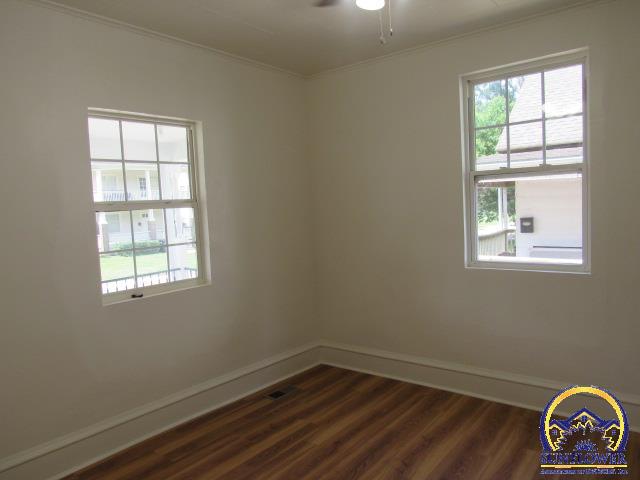 612 Southwest 5th Street Topeka, KS 66603 - Photo 11 of 18 Front bedroom