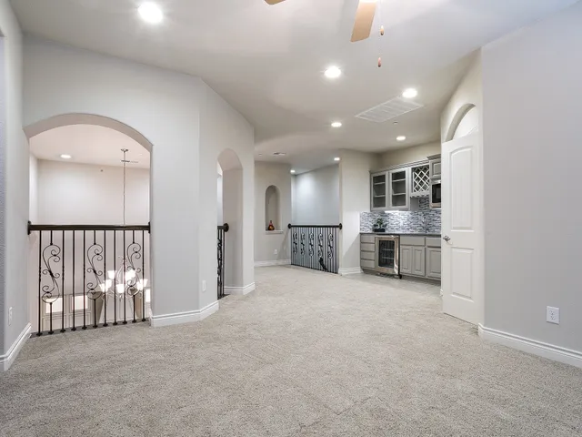a bathroom with a sink toilet and a mirror