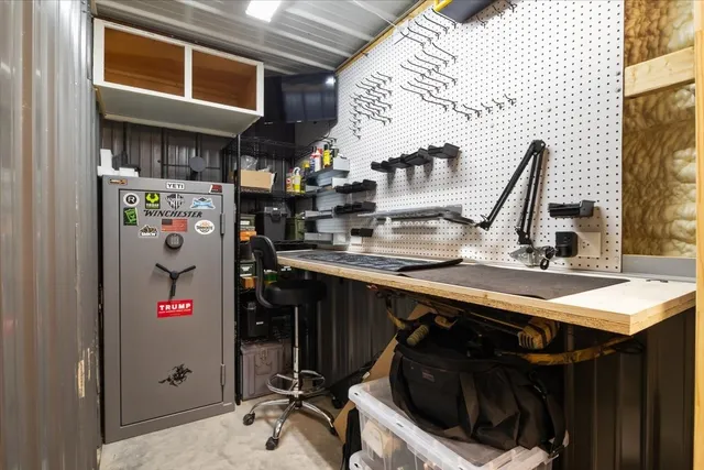 a view of a storage room with utility area