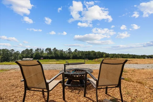 a view of a kitchen with workspace and a window