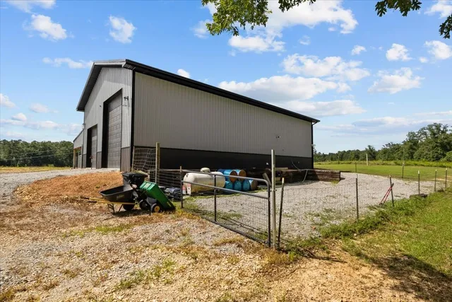 front view of a house with a swimming pool