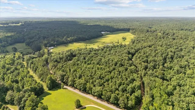 a view of an ocean and a mountain