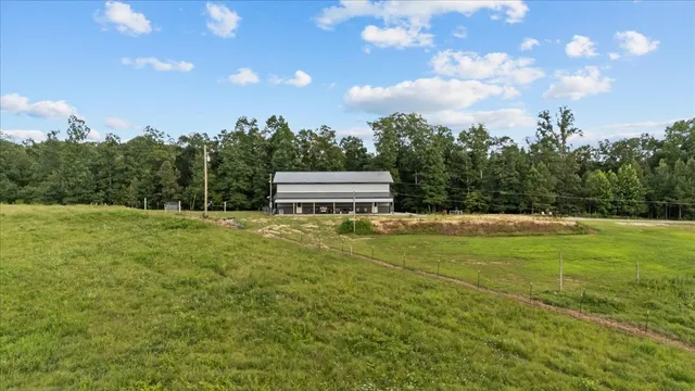 a view of chairs and table in the patio