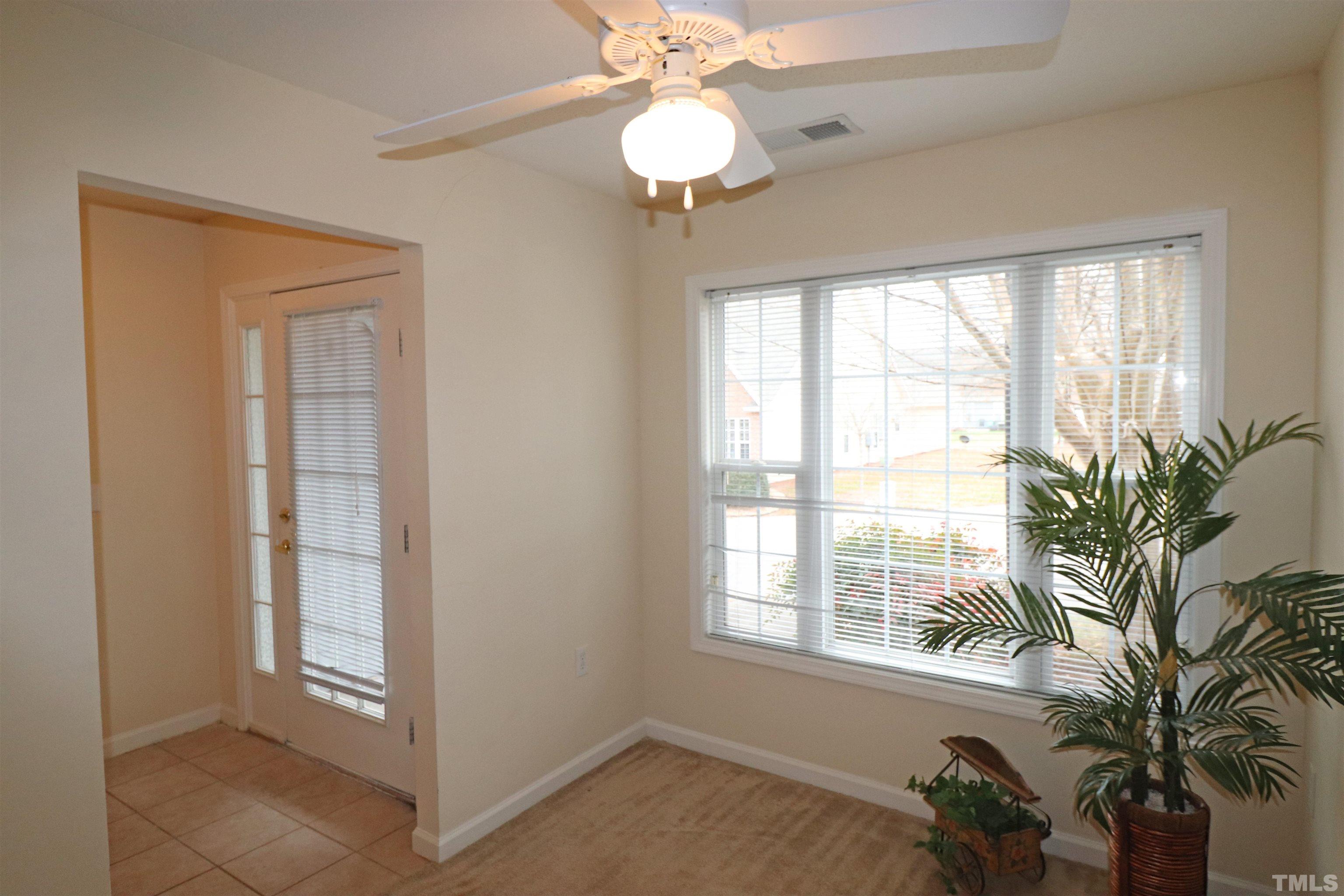 11301 Clubhaven Place, Unit 102 Raleigh, NC 27617 - Photo 12 of 53 a view of an empty room with a window