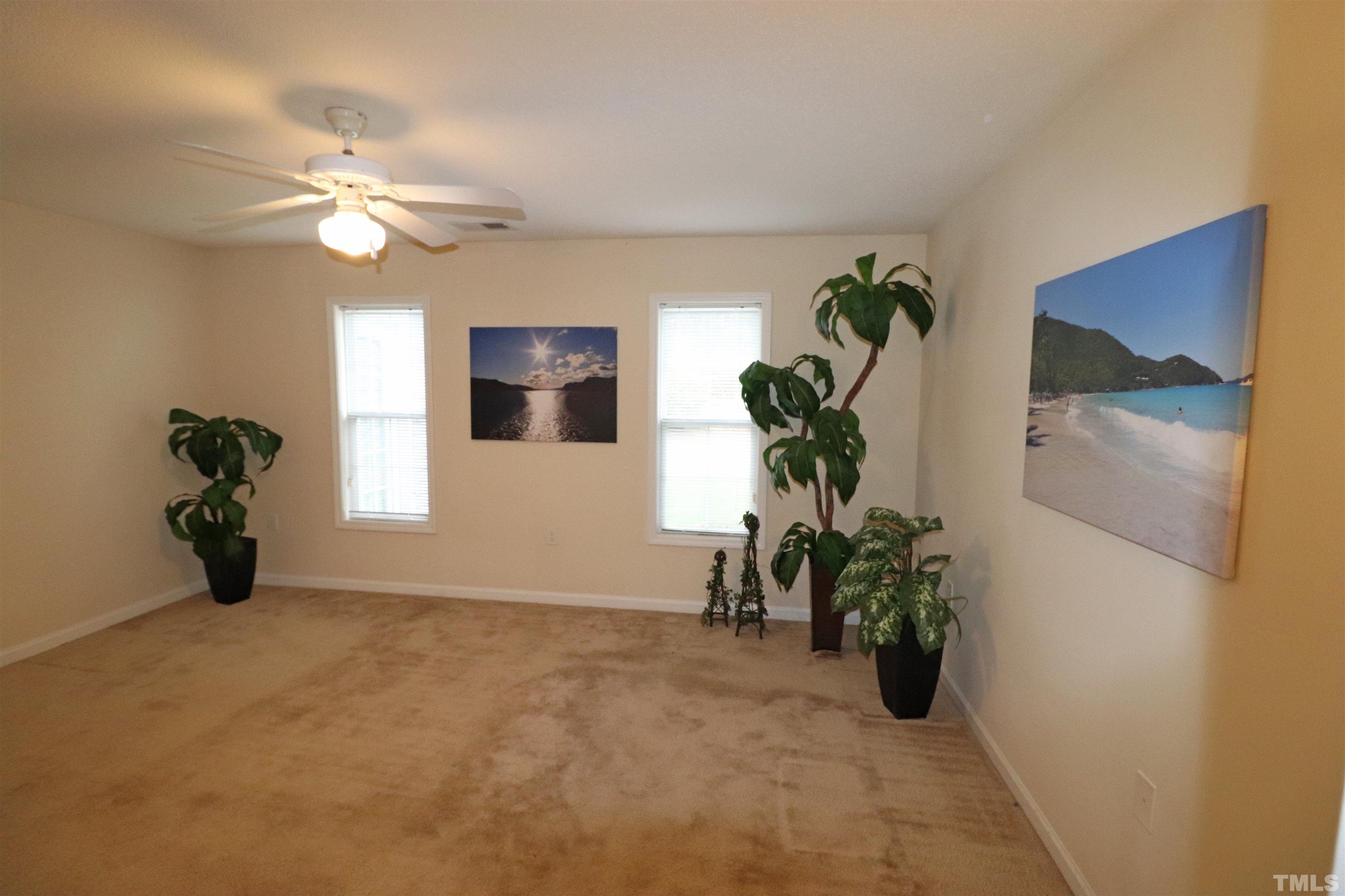 11301 Clubhaven Place, Unit 102 Raleigh, NC 27617 - Photo 37 of 53 a view of a livingroom with a potted plant