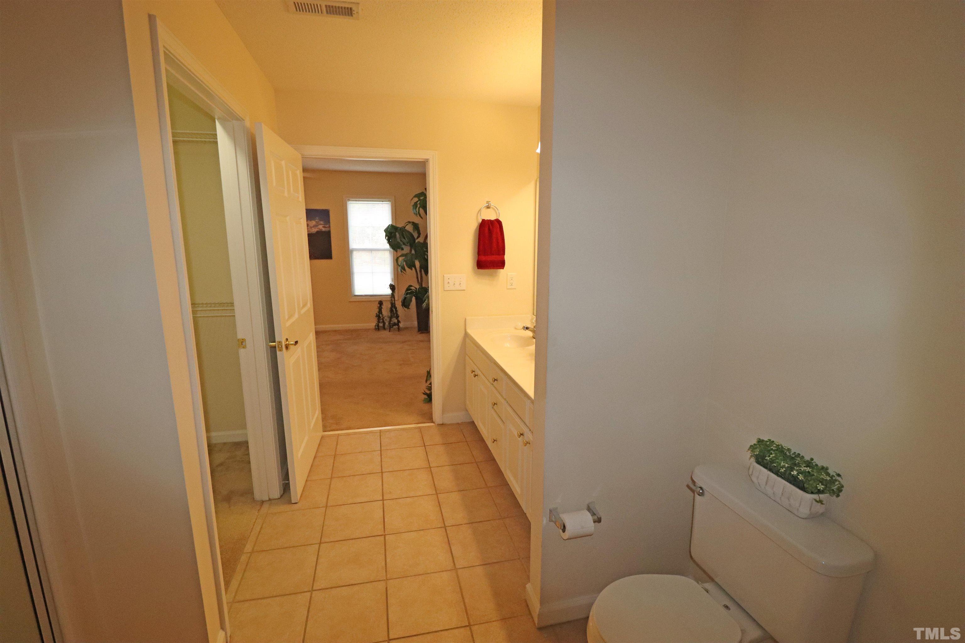 11301 Clubhaven Place, Unit 102 Raleigh, NC 27617 - Photo 43 of 53 a bathroom with a sink and toilet