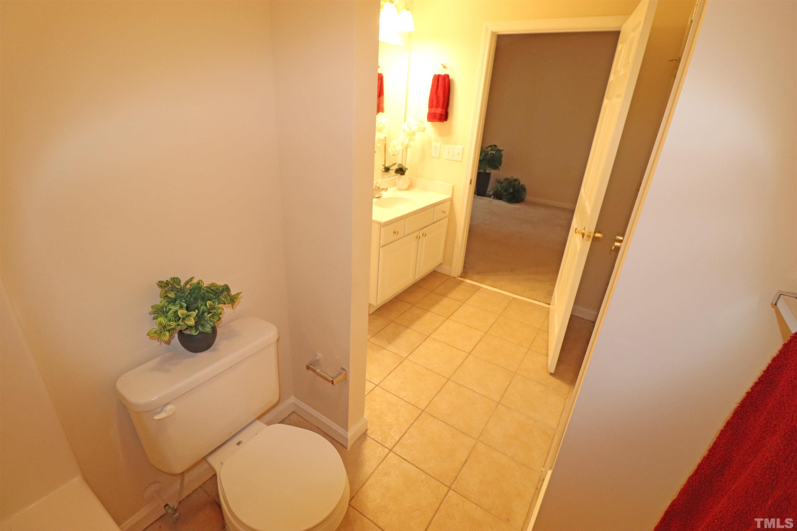11301 Clubhaven Place, Unit 102 Raleigh, NC 27617 - Photo 47 of 53 a bathroom with a toilet and a shower