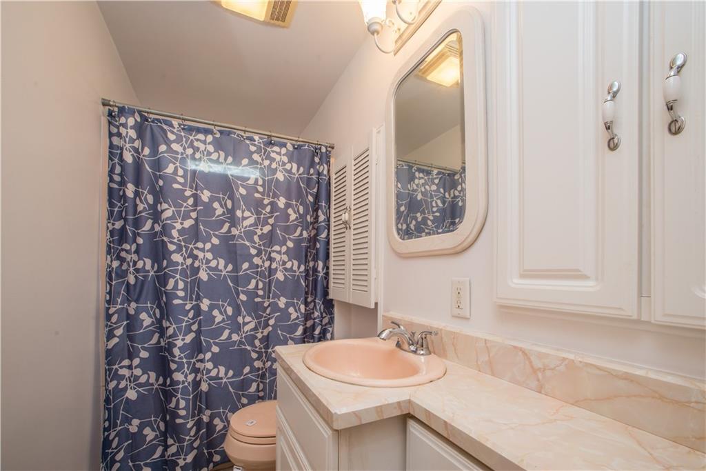 3816 West Run Road Homestead, PA 15120 - Photo 11 of 21 The full bath on the first floor has a combination tub and shower.
