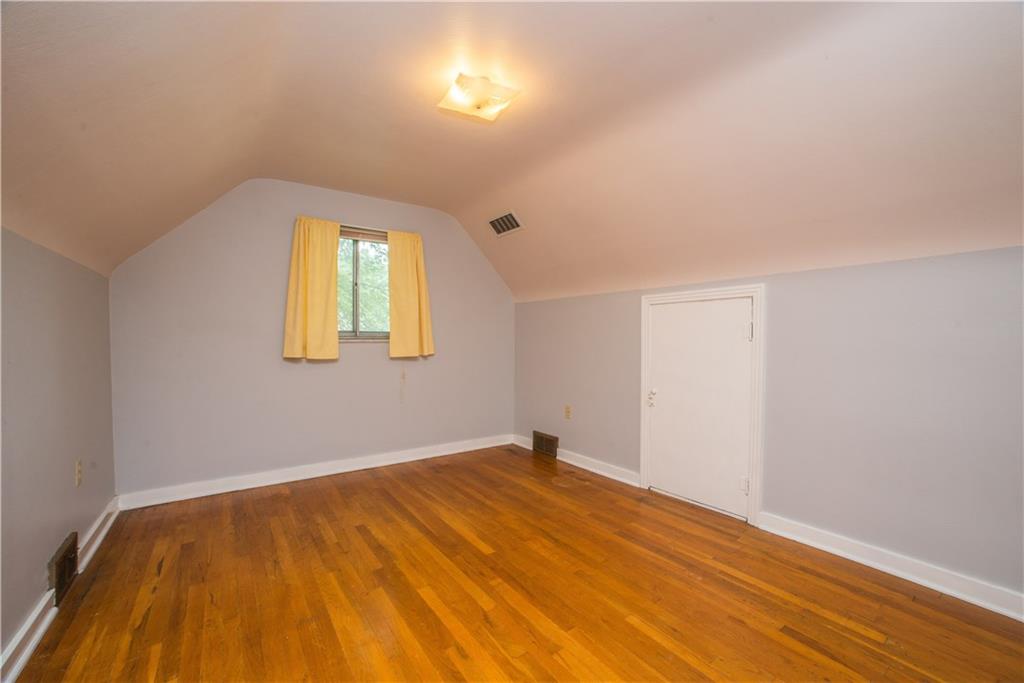 3816 West Run Road Homestead, PA 15120 - Photo 16 of 21 Storage is offered under the eaves, and access to that space is found in the third bedroom, via the door shown on the right.