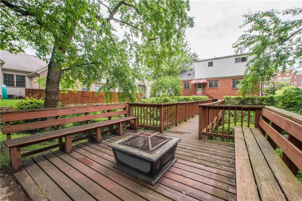 3816 West Run Road Homestead, PA 15120 - Photo 20 of 21 Another sitting area, outfitted with bench-style seating, is found at the far-end of the deck.
