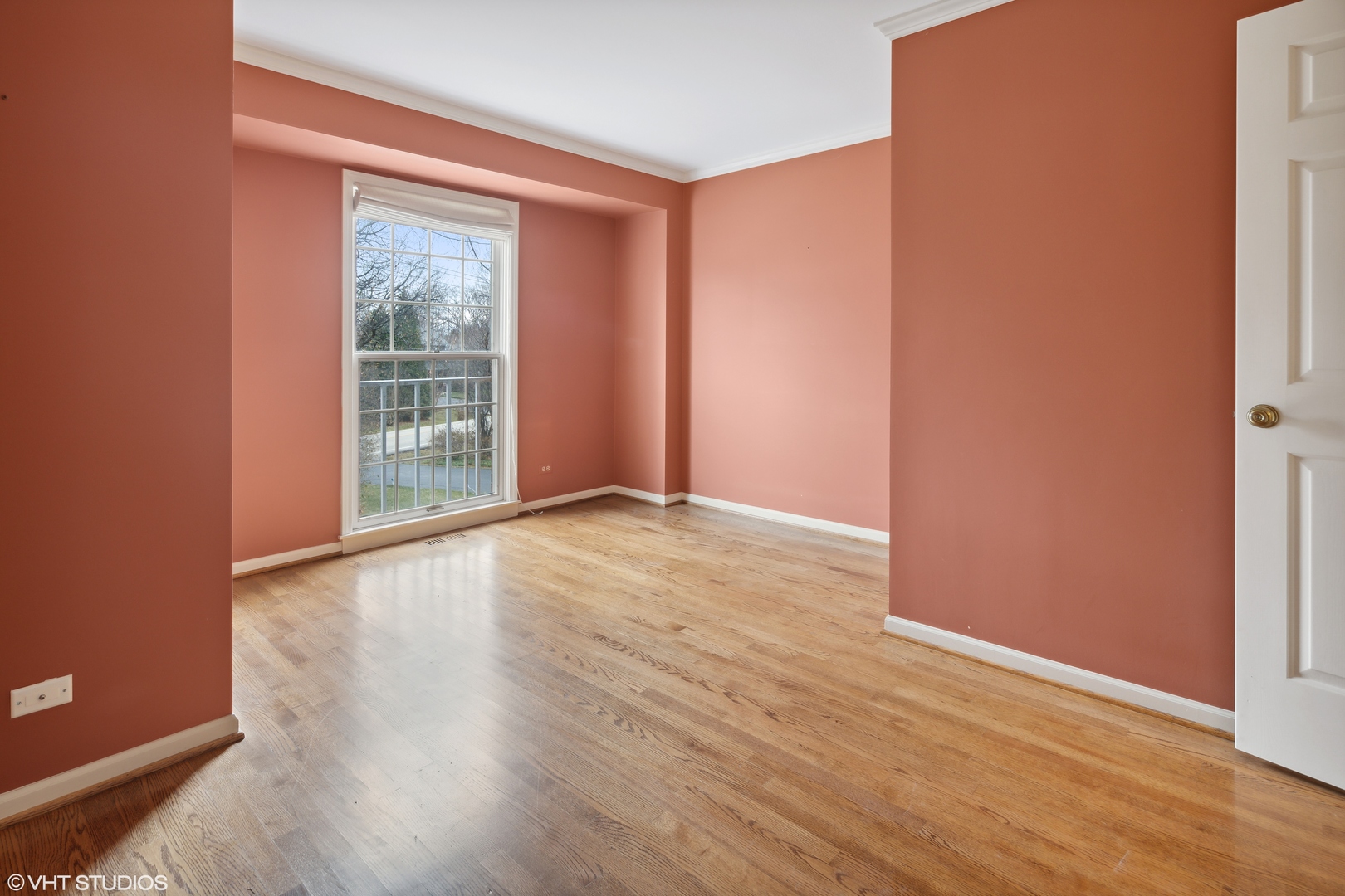 1050 South Ridge Road Lake Forest, IL 60045 - Photo 32 of 40 an empty room with wooden floor and windows