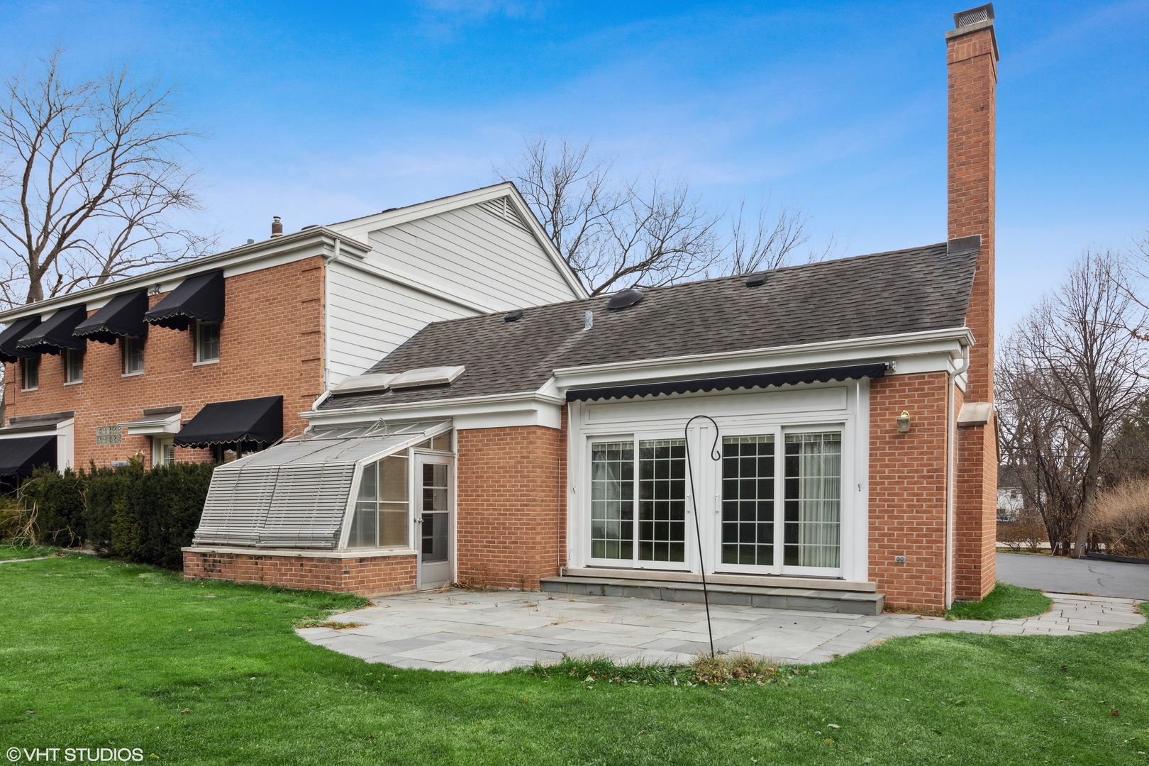 1050 South Ridge Road Lake Forest, IL 60045 - Photo 4 of 40 a front view of a house with a yard