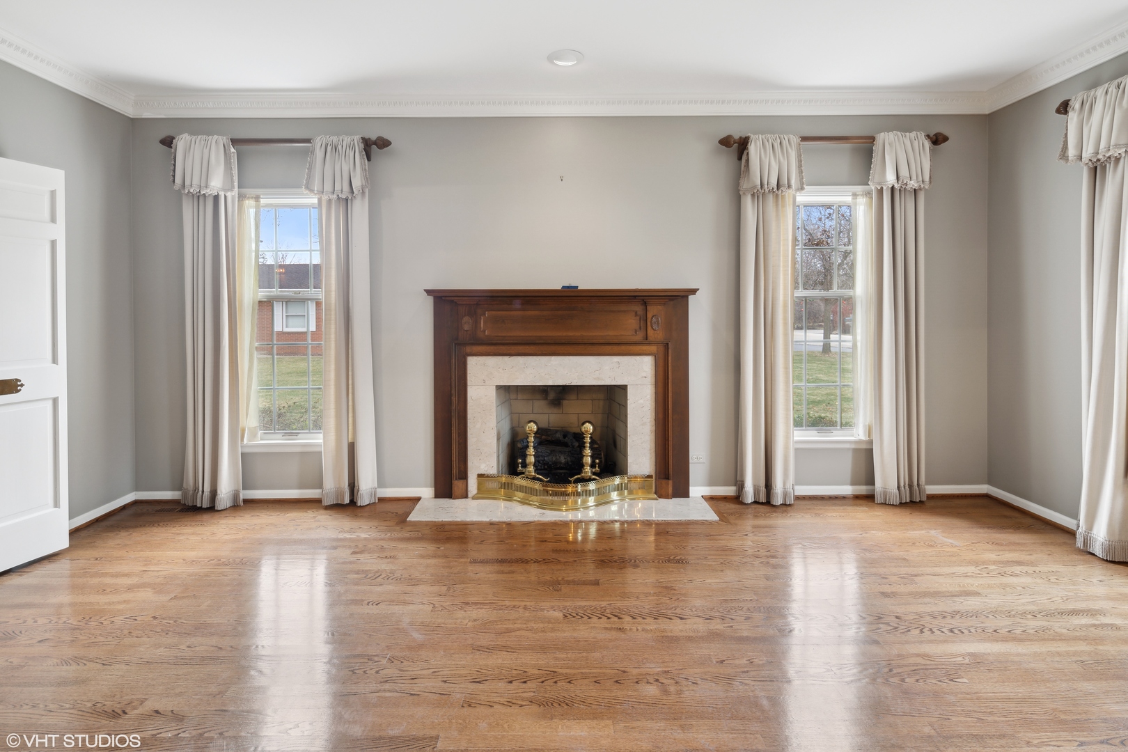 1050 South Ridge Road Lake Forest, IL 60045 - Photo 10 of 40 a view of an empty room with window and fire place