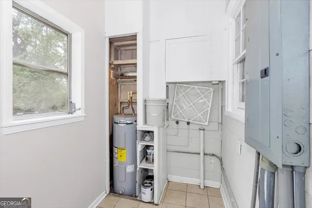 a bathroom with a tub and a shower