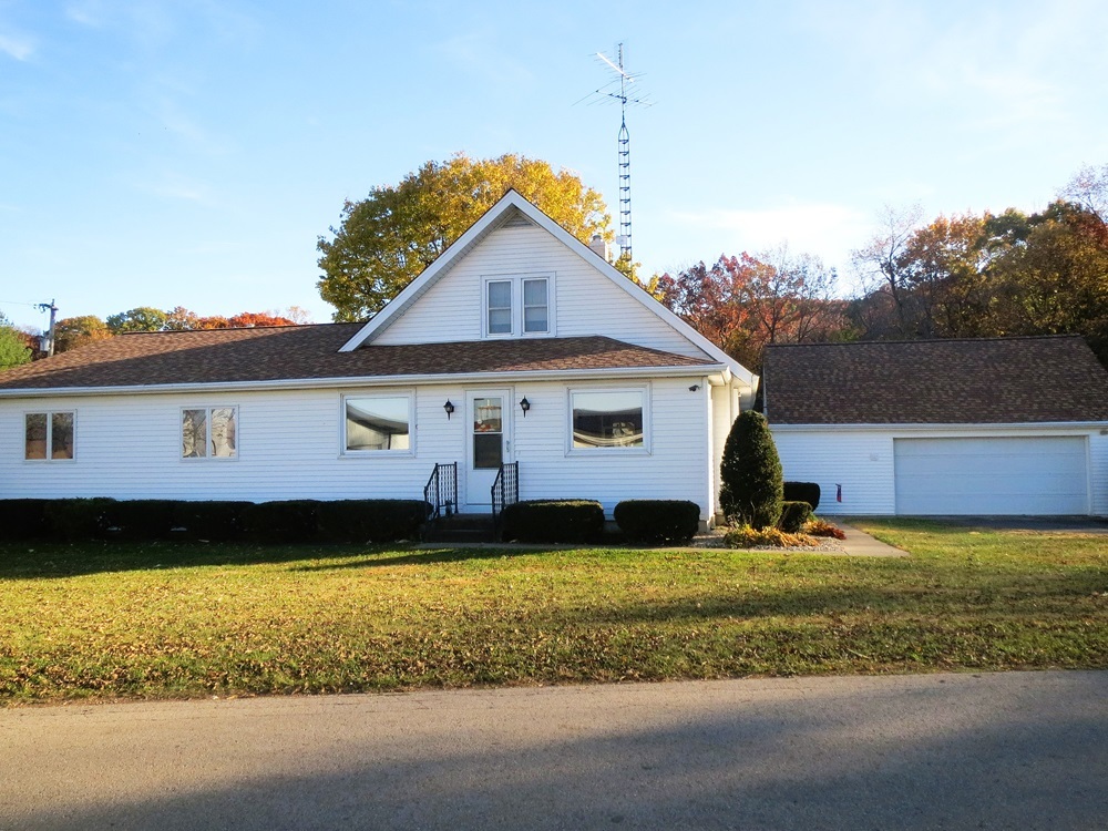1027 Bluff Road Dixon, IL 61021 - Photo 1 of 48 a front view of a house with a yard
