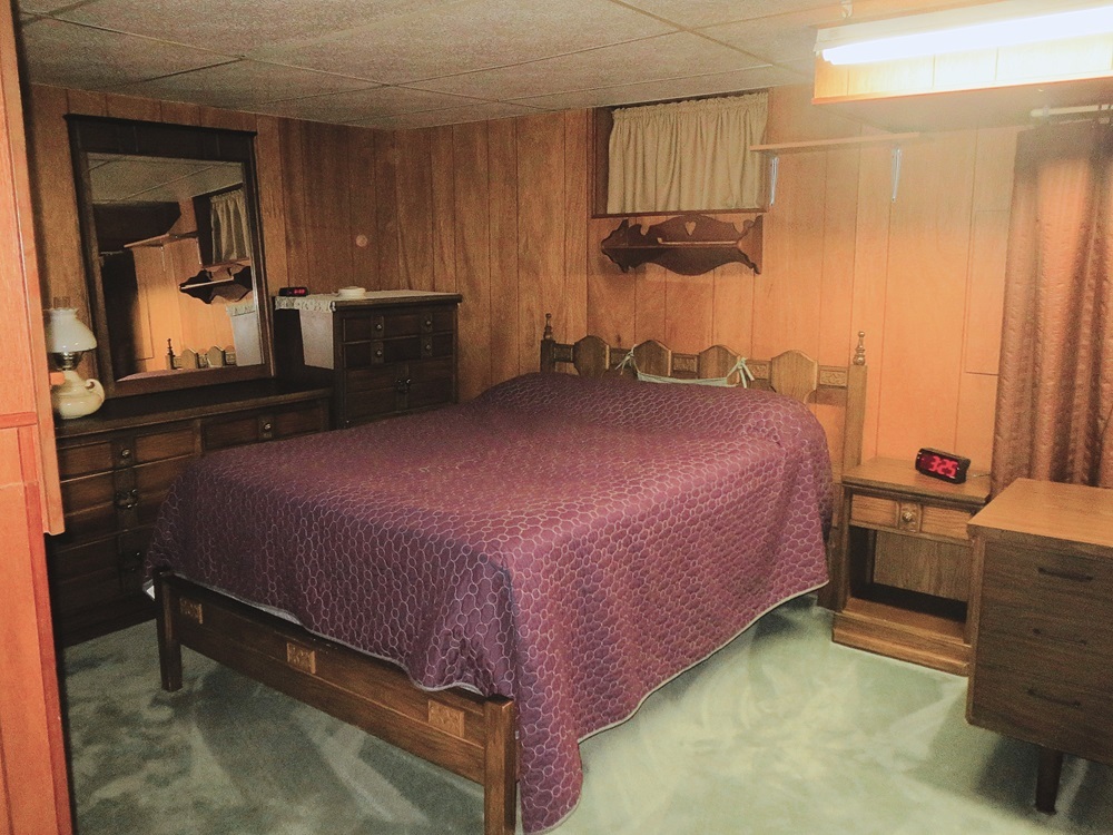 1027 Bluff Road Dixon, IL 61021 - Photo 20 of 48 a bedroom with a bed and a dresser